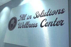 all in solutions wellness center lobby sign